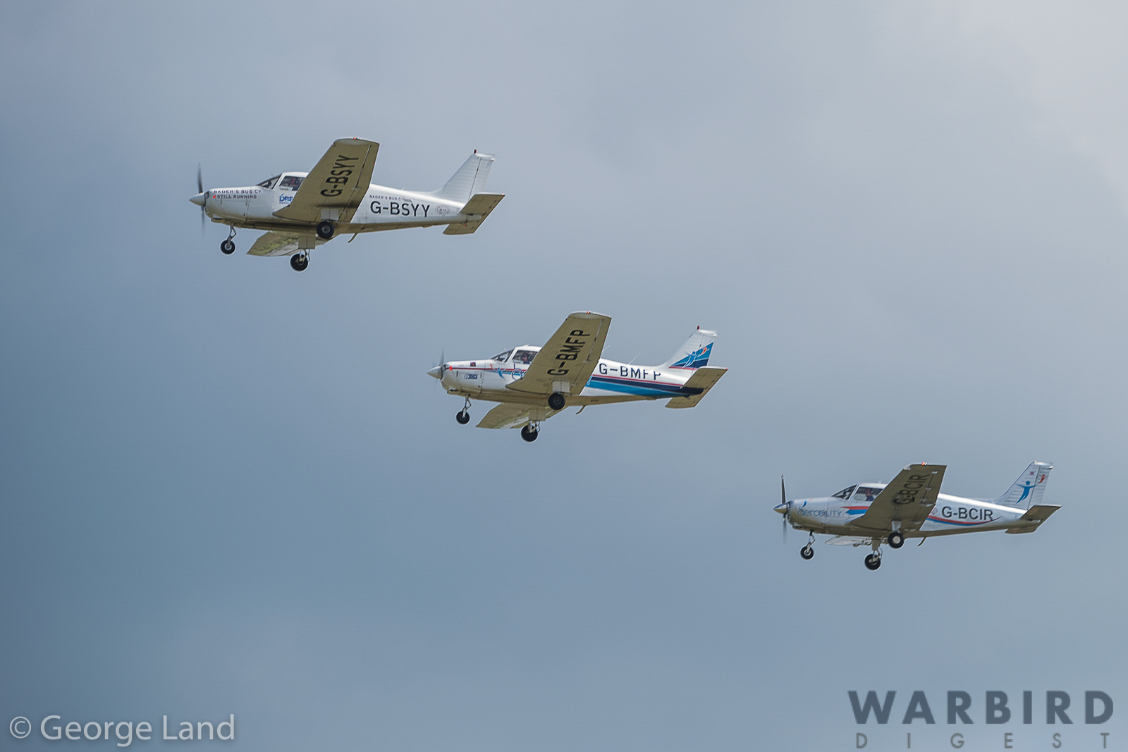 Duxford Air Festival - Air Show Report 50 Baders Bus CompanyPiper PA 28 161 Cherokee Warrior ll G BSYY sn 2816009 G BMFP sn287916243 PA 28 151 Modified sn 287415401 D75 3192