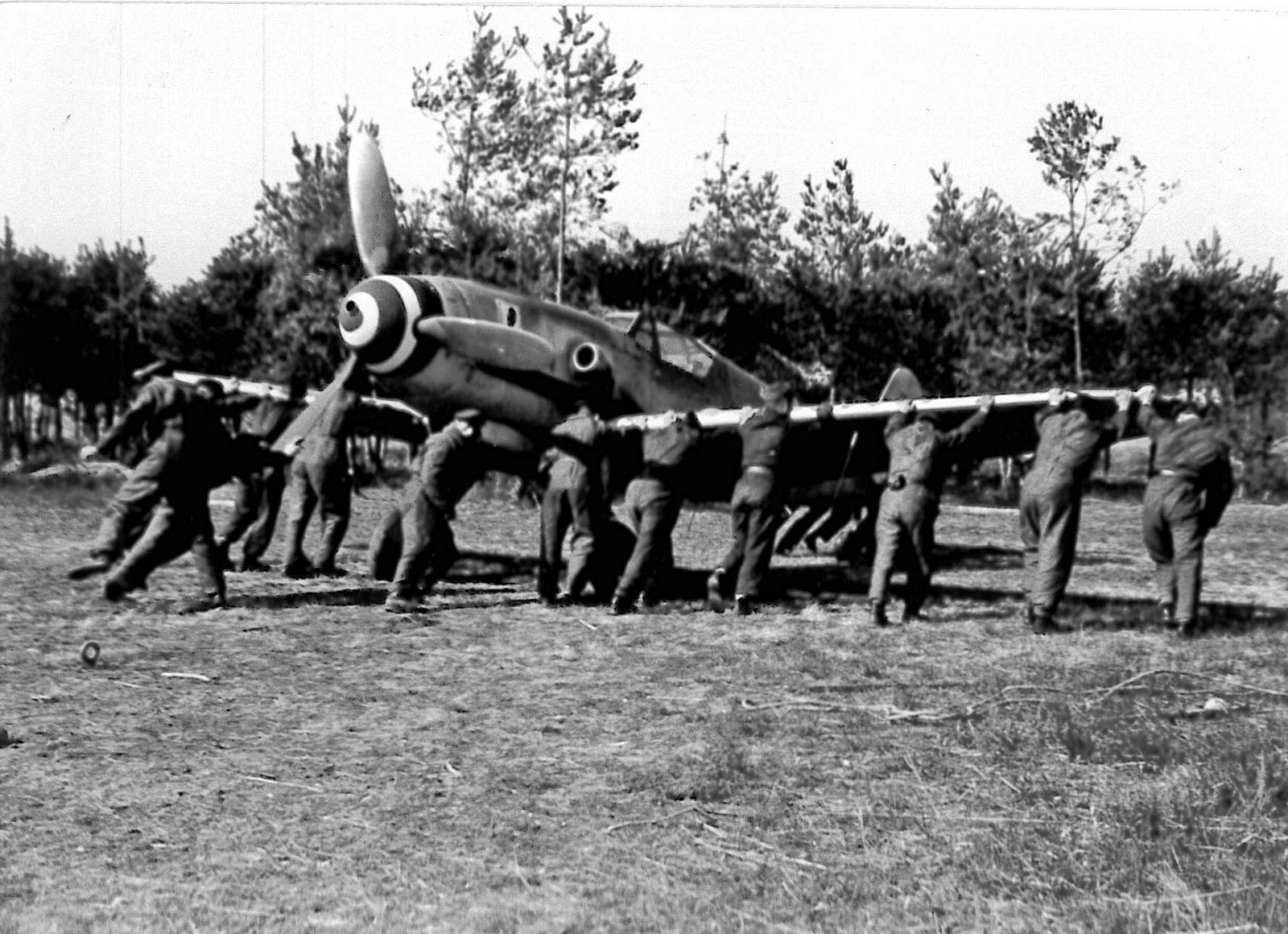 Adriano Visconti - The Unforgotten Hero 15 Visconti's Bf-109G being pushed in the sheltered area of Lonate Pozzolo airfield. ( Luigino Caliaro Archive)