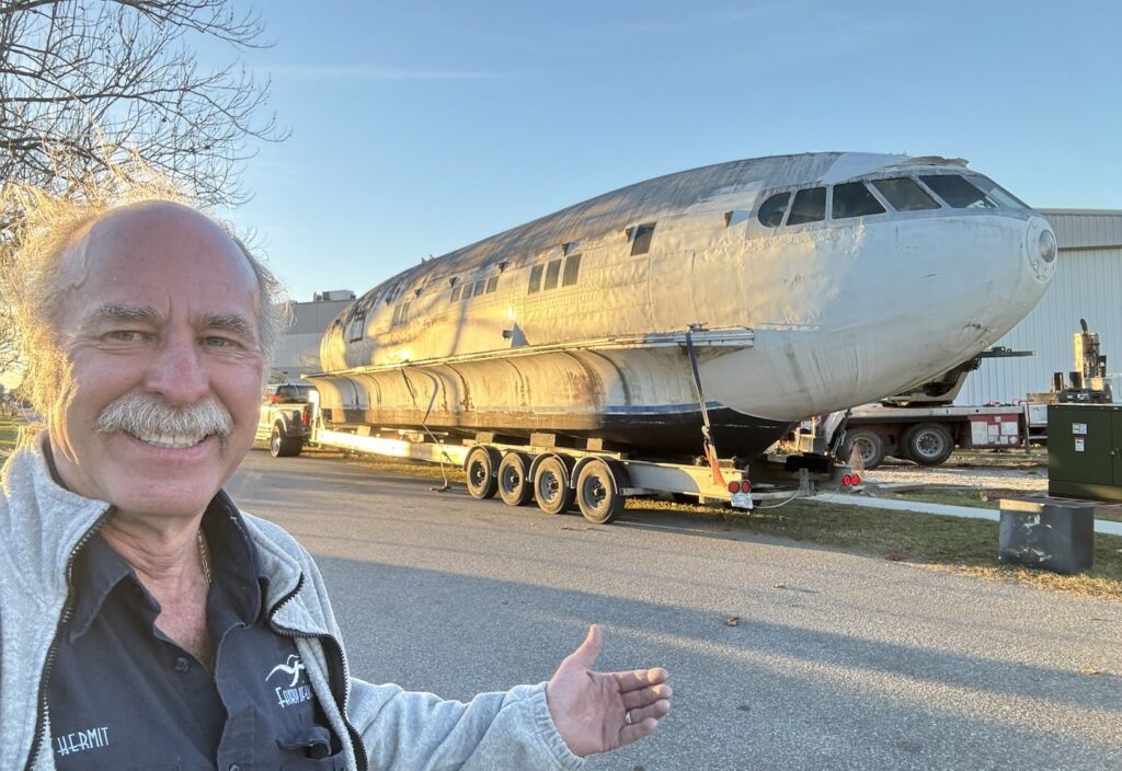 Kermit Weeks Acquires Unique Boeing Stratoliner Houseboat 22 Boeing 307 N19904Cosmic Muffin on trailer with Kermit Weeks