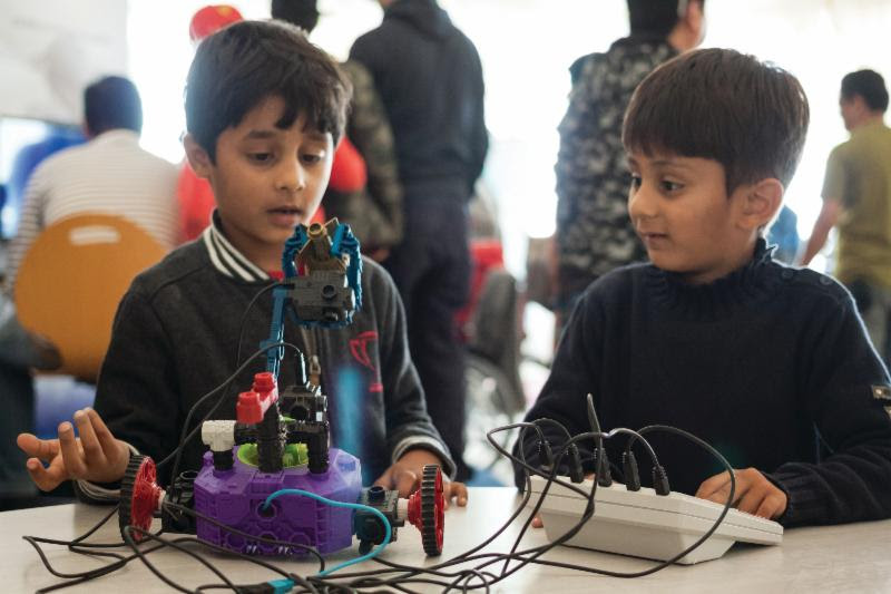 Museum Continues to Expand Educational Offerings and Aerospace Programming 11 Boys build their own robot during a workshop at The Museum of Flight. Photo Ted Huetter/The Museum of Flight.