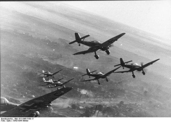 The Luftwaffe in 1961 by Howard "Scrappy" Johnson, Part 1 16 A formation of Junkers Ju 87 "Stuka" over a European city in the- 1934-1944 circa( Image by German Federal Archives)