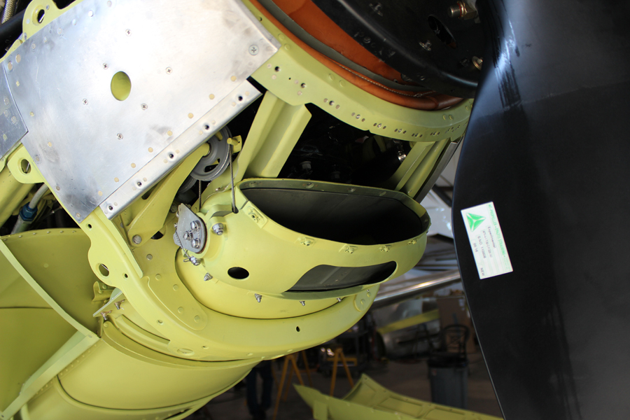 XP-82 Twin Mustang - October, 2017 - Restoration Update 27 A view of the newly-installed carburetor air intake barrel on the left engine giving an idea of how it operates to regulate intake air temperature. (photo via Tom Reilly)