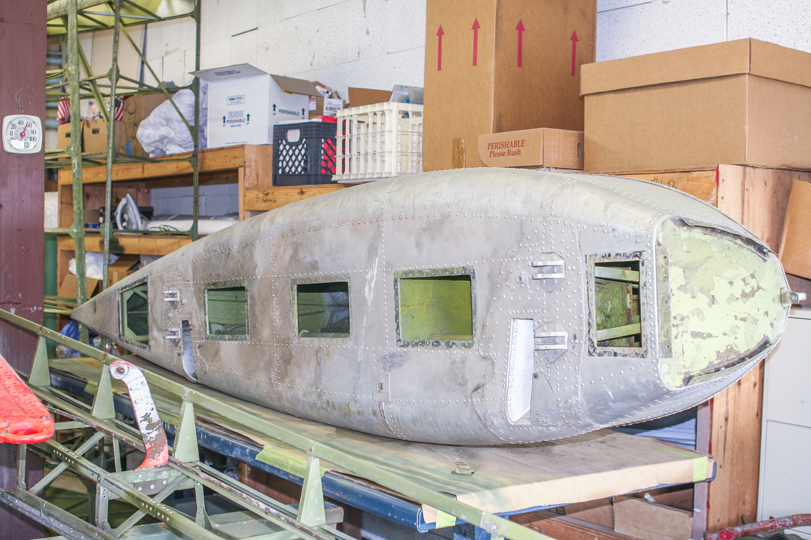 CAF PBY Catalina Restoration Update 14 The wingtip floats undergoing inspection. Note the panels removed on top. There is no photo but the float braces are also being taken apart and inspected.