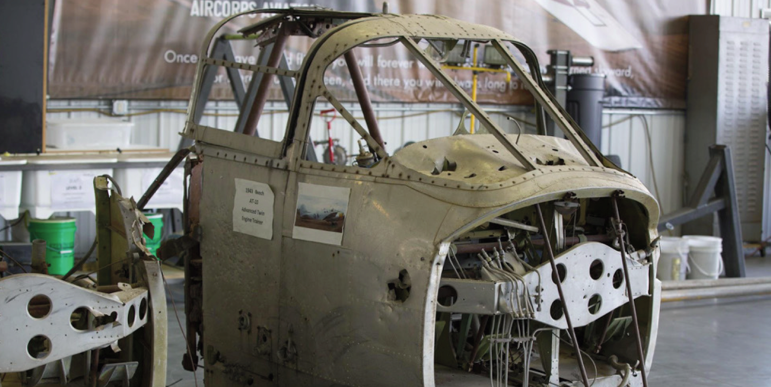Cadet Air Corps Museum AT-10 Restoration Project 14 This one has the windscreen and the rest of the upper cockpit enclosure still attached.