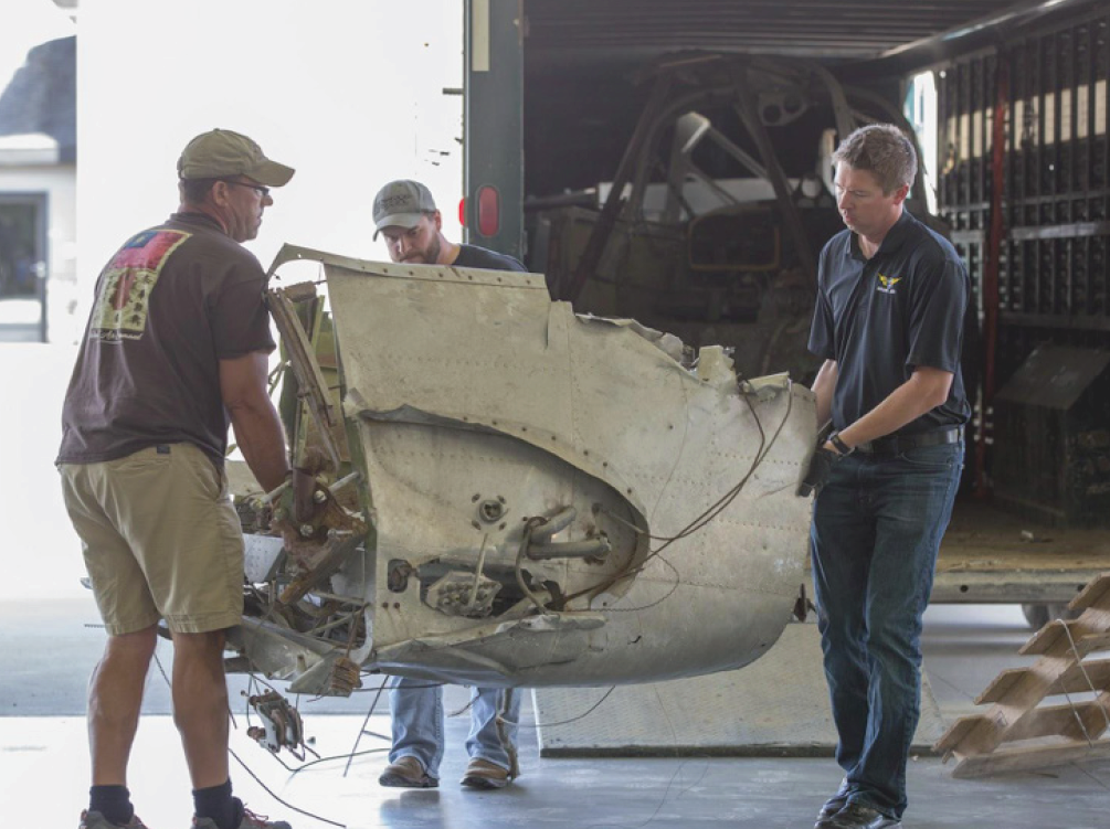 Cadet Air Corps Museum AT-10 Restoration Project 13 With the help of AirCorps’ Erik Hokuf and Tye Halvas, Brooks brings in a cockpit section that he and Sam played in as kids.
