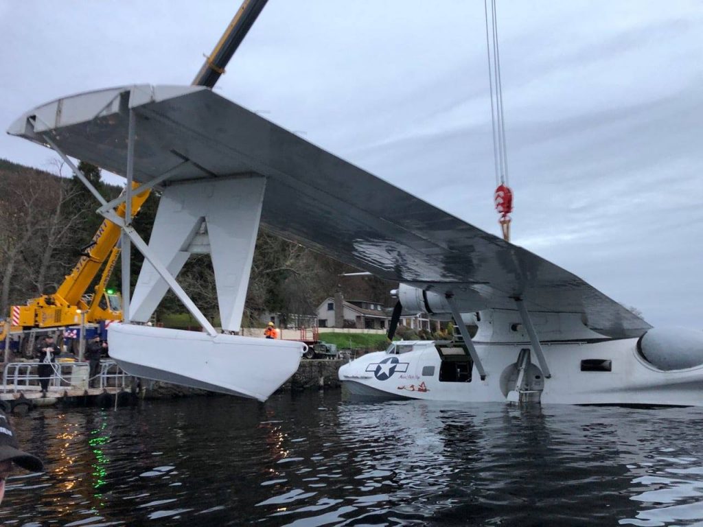 PBY Catalina "Miss Pick Up" Flies Again! 10 Canso PBY Catalina Miss Pick Up being lowered onto the water. o