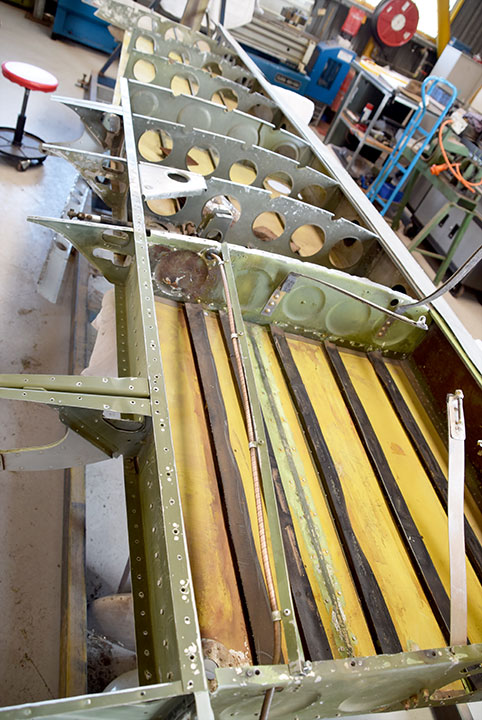Downunder Warbird Roundup 24 Cessna O1 Bird dog wing undergoes restoration of her wing assembly towards a first flight in the future in the VFR hangar