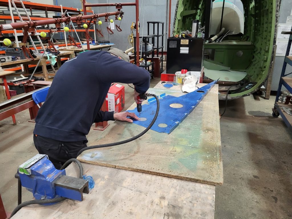 Lancaster NX611 ‘Just Jane’ – Restoration Update 240 and 241 13 Chris forming the holes in the ribs for the trailing edge