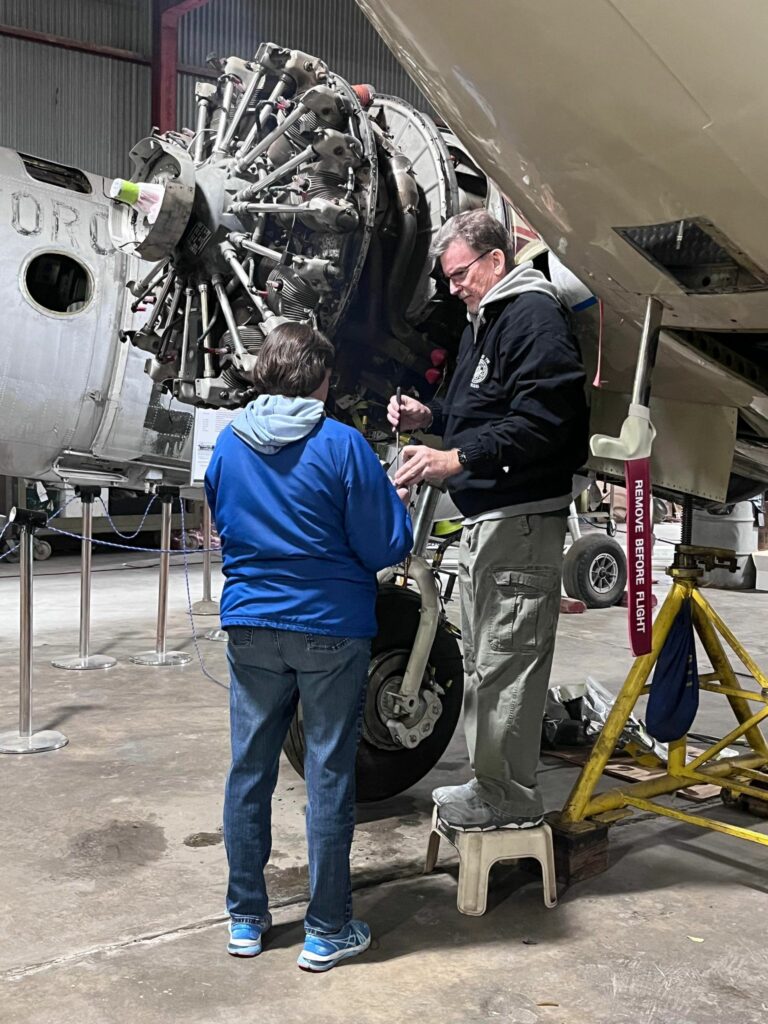 Restoring Jackie Cochran's Twin Beech 11 Cindy and Kevin Guiles removing vacuum pump