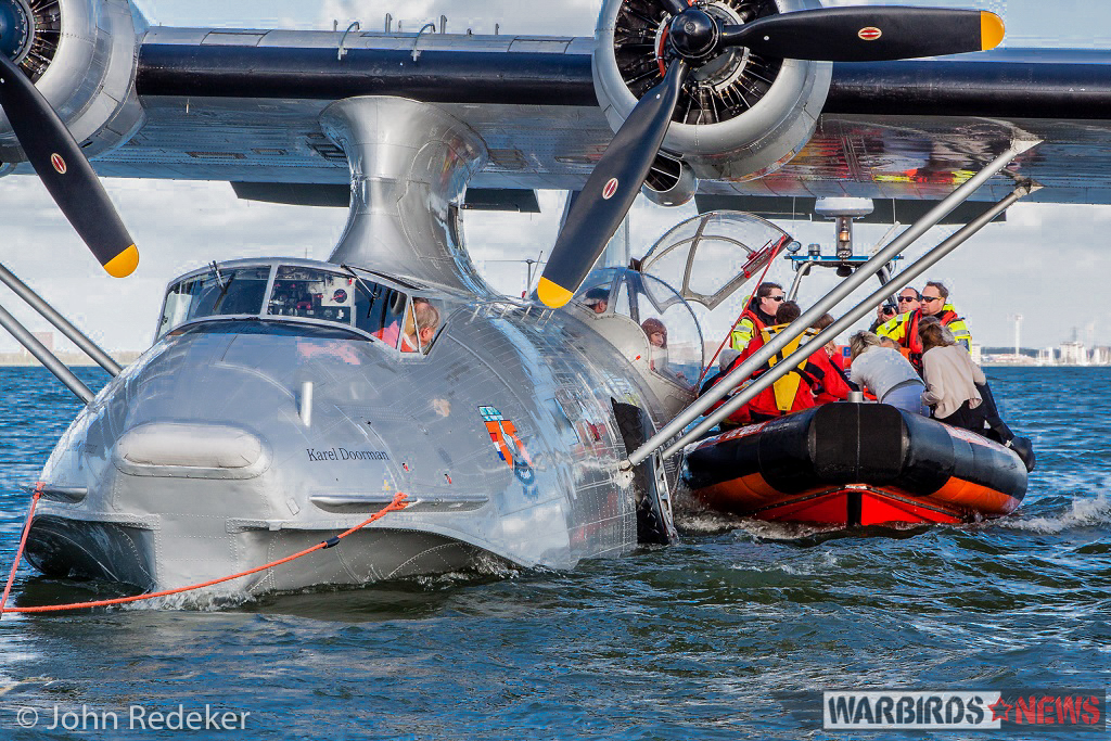 Splashdown For World's Oldest Flying Catalina 12 Passengers had the opportunity of a full-stop landing, and a ride in a boat during the Catalina's first flight of the season. (photo by John Redeker)