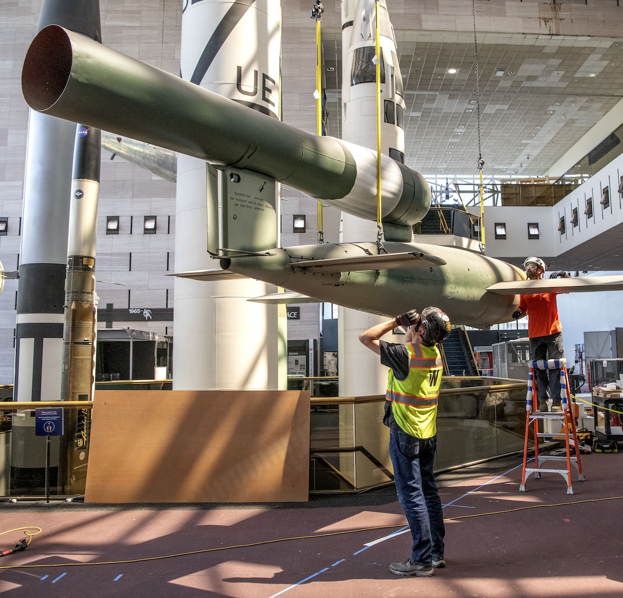 National Air and Space Museum Prepares for a New WWII Gallery 17 Contractors and staff lower the V 1 Cruise Missile in the Space Race gallery at Space Museum in Washington DC April 12 2022. Smithsonian photo by Jim Preston
