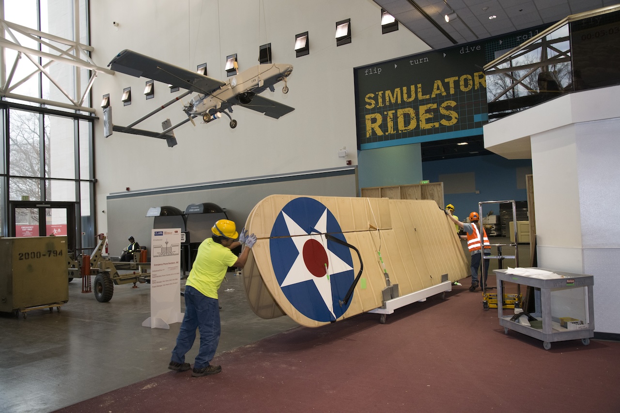 National Air and Space Museum Prepares For Opening of New WWI Gallery 10 Contractors and staff move the wings of the De Havilland DH 4 into temporary storage at the National Air and Space Museum in Washington DC February 15 2019 . Smithsonian Photo by Mark Avino