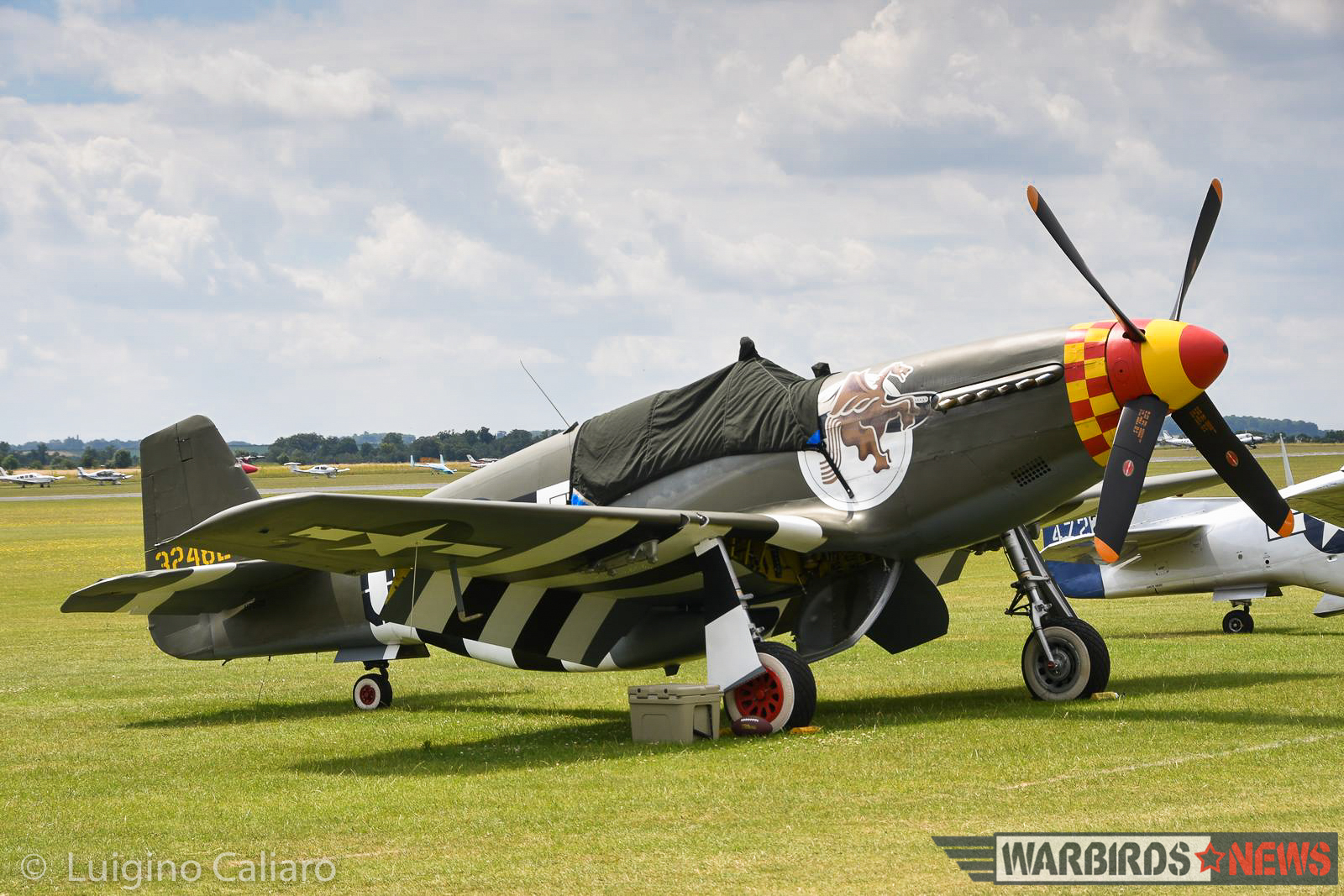 Flying Legends 2017 - Air Show Report 19 Berlin Express, sitting somewhat forlorn on the flightline with her shattered canopy covered by a tarpaulin. (photo by Luigino Caliaro)