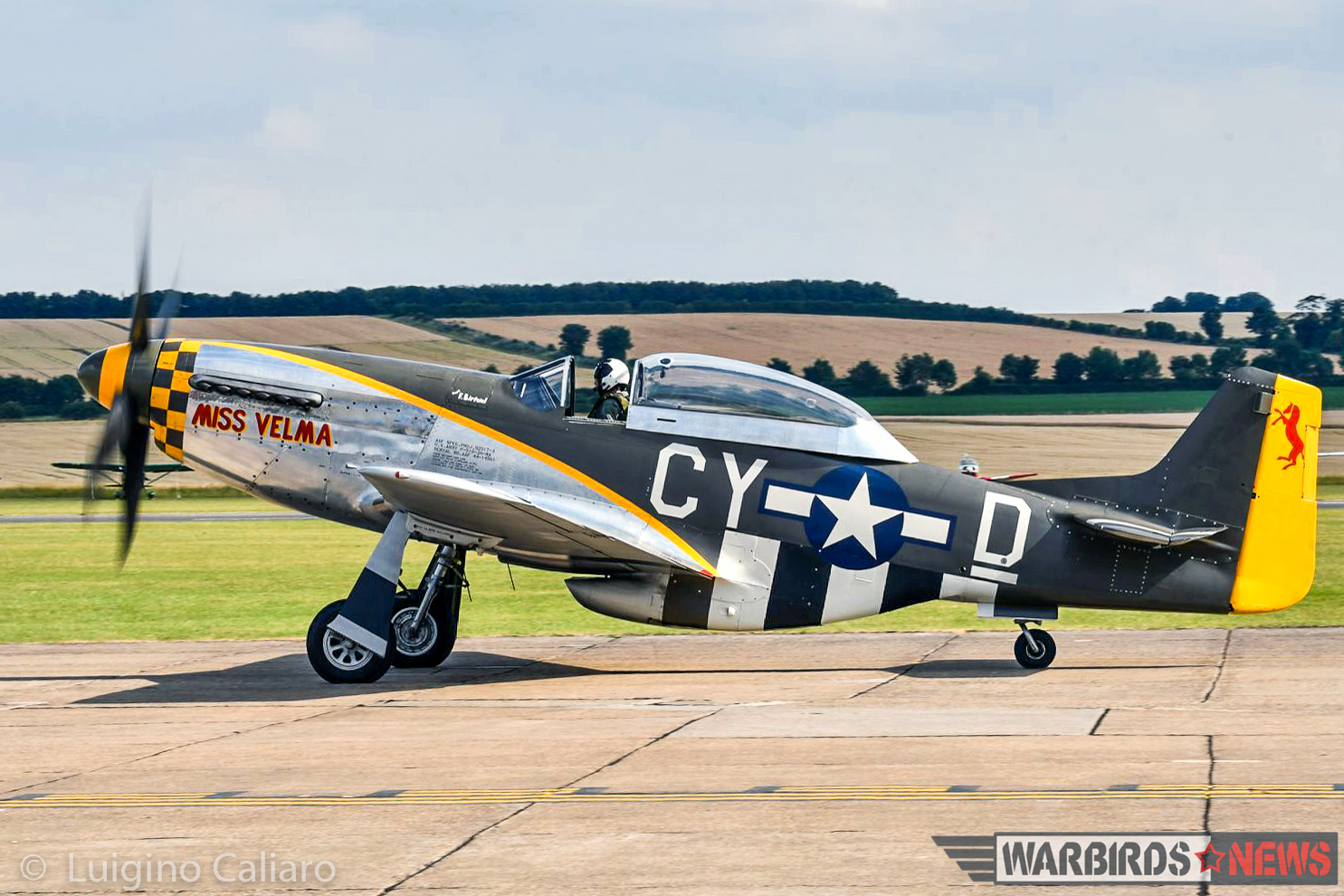 Flying Legends 2017 - Air Show Report 44 The ill-fated P-51D 'Miss Velma' taxies out for takeoff before the Balbo. As these words were written, the Mustang was already back at Duxford, on its gear, undergoing damage assessment. (photo by Luigino Caliaro)
