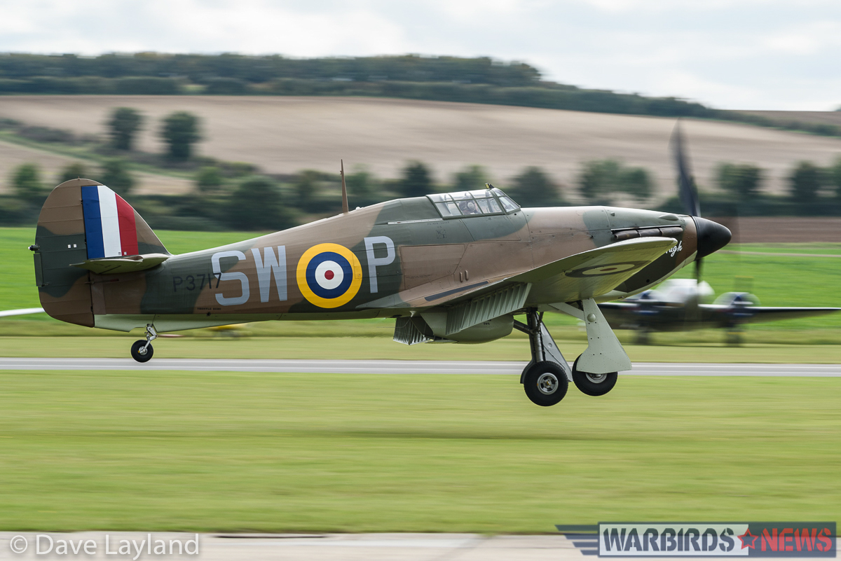 Duxford - Battle of Britain Air Show Report 22 Hurricane Mk.I P3717 of Hurricane Heritage just before she touches down on Duxford's grass runway. (photo by Dave Layland)