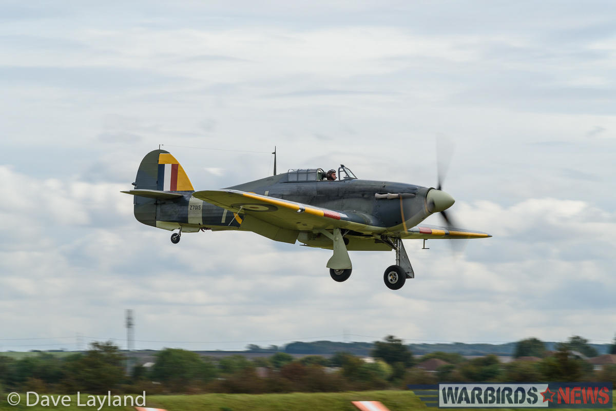 Duxford - Battle of Britain Air Show Report 21 Sea Hurricane Z7015 from the Shuttleworth Collection crosses the runway apron. (photo by Dave Layland)
