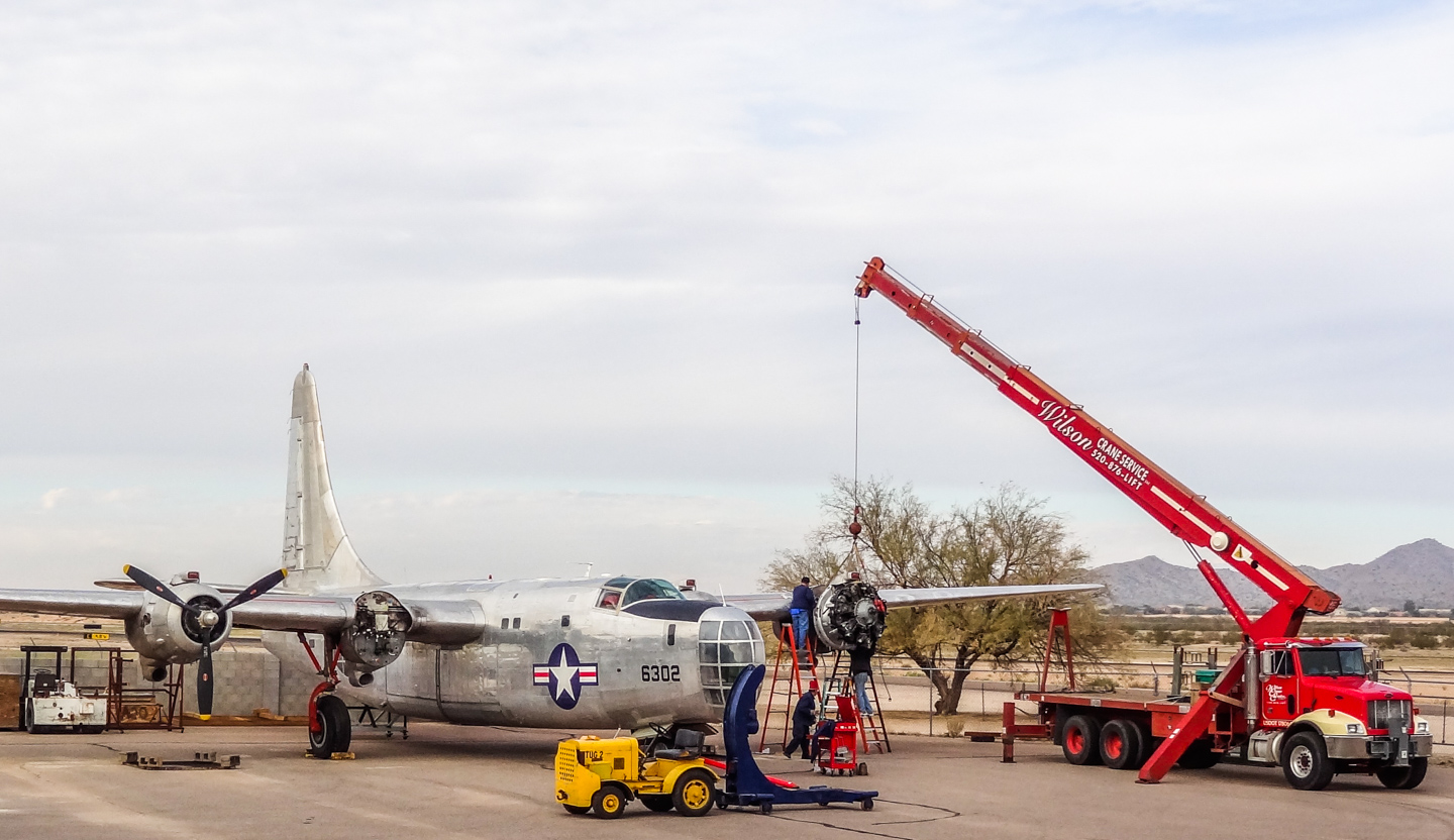 Privateer Airborne 34 Installing the #1 engine. (GossHawk Unlimited photo)