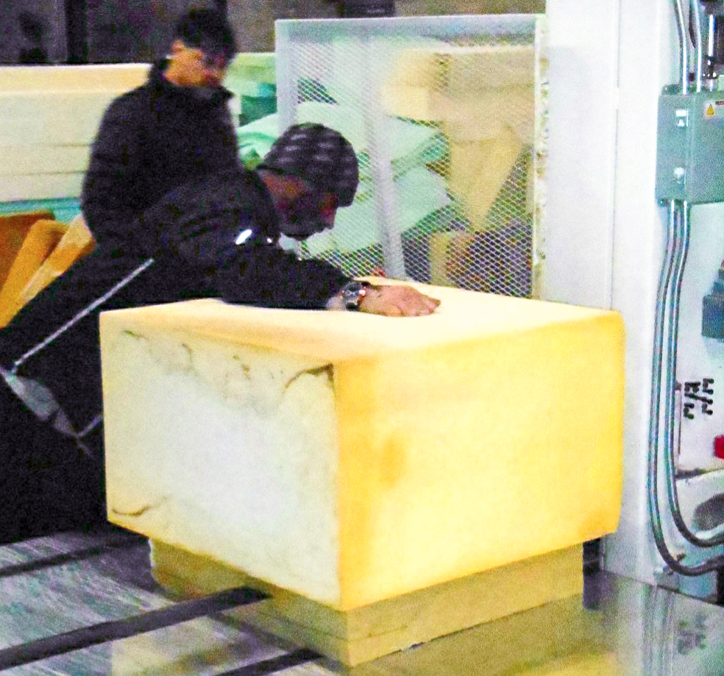 New England Air Museum - DC-3 Restoration Update 14 An upholstery expert cutting foam for the new seat padding. (photo via NEAM)