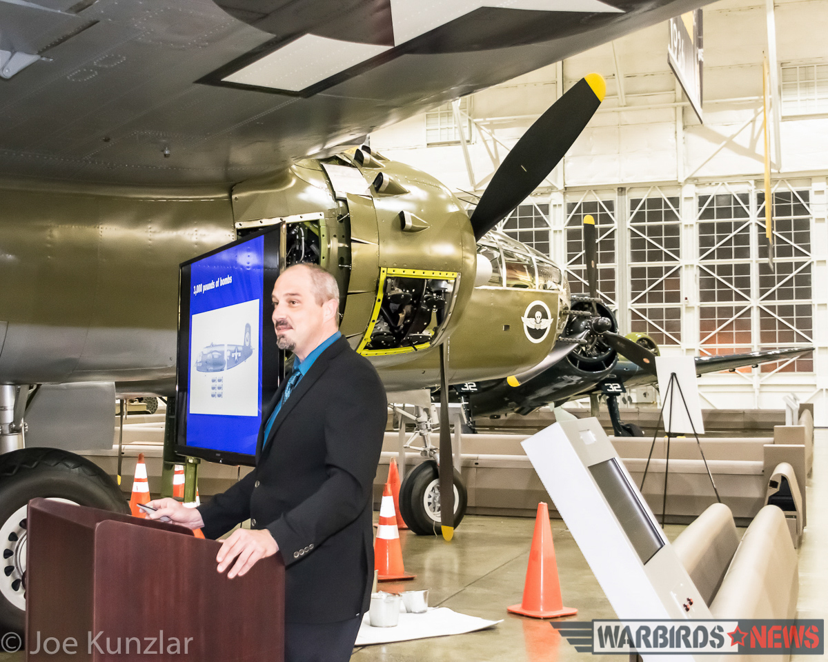 All-Access Tour of FHC's Superb North American B-25J Mitchell 13 Cory Graff, FHC Curator presenting his lecture on the B-25 in front of the museum's example. (photo by Joe Kunslar)