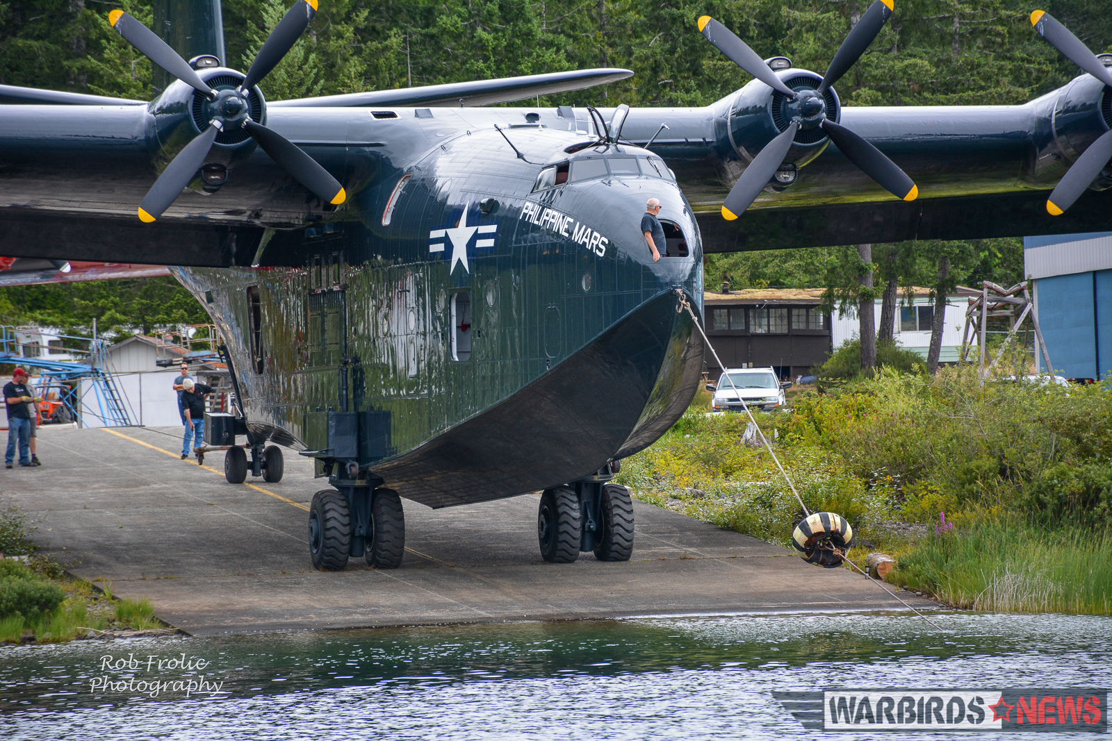 Martin Mars Movements - The Ultimate Flying Experience! 11 Philippine Mars rolling down the flying boat ramp at Sproat Lake. (photo by Rob Frolic)
