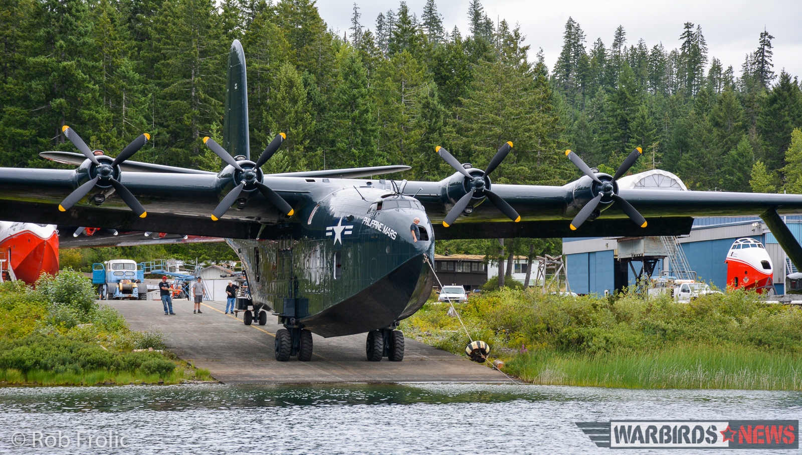 Martin Mars Movements - The Ultimate Flying Experience! 12 Philippine Mars rolling down the flying boat ramp at Sproat Lake. (photo by Rob Frolic)