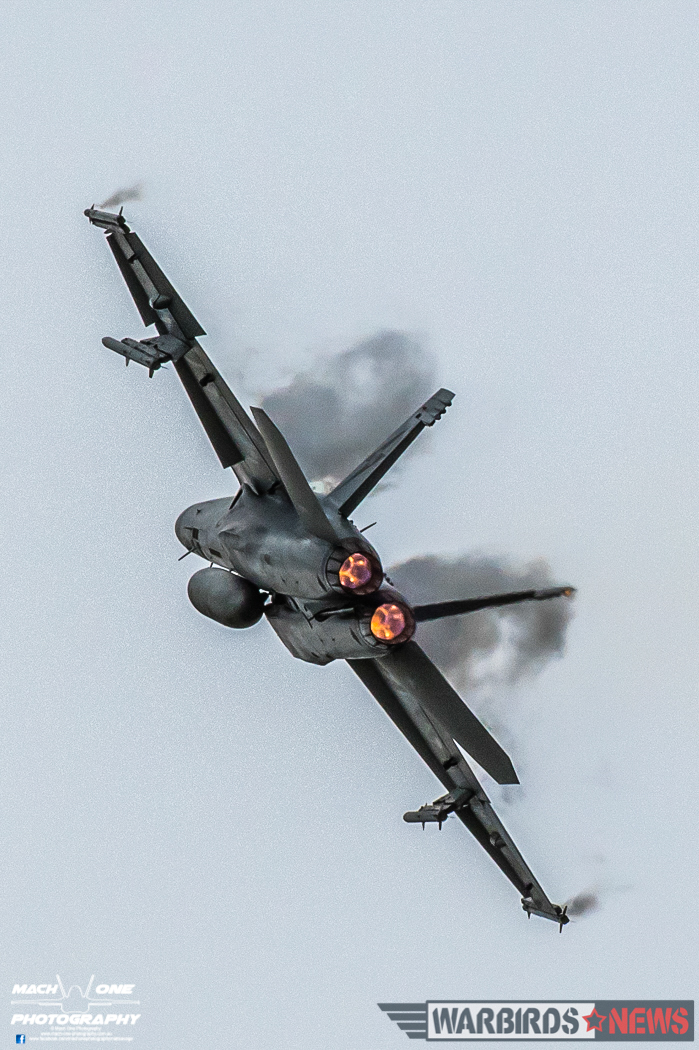 Australia’s Centenary Squadrons – A Celebration of 100 Years Defending The Country 32 Boeing F/A-18F Rhino A44-201 of 1 Squadron making clouds of its own during its handling display. (Photo by Matt Savage/Mach One Photography)