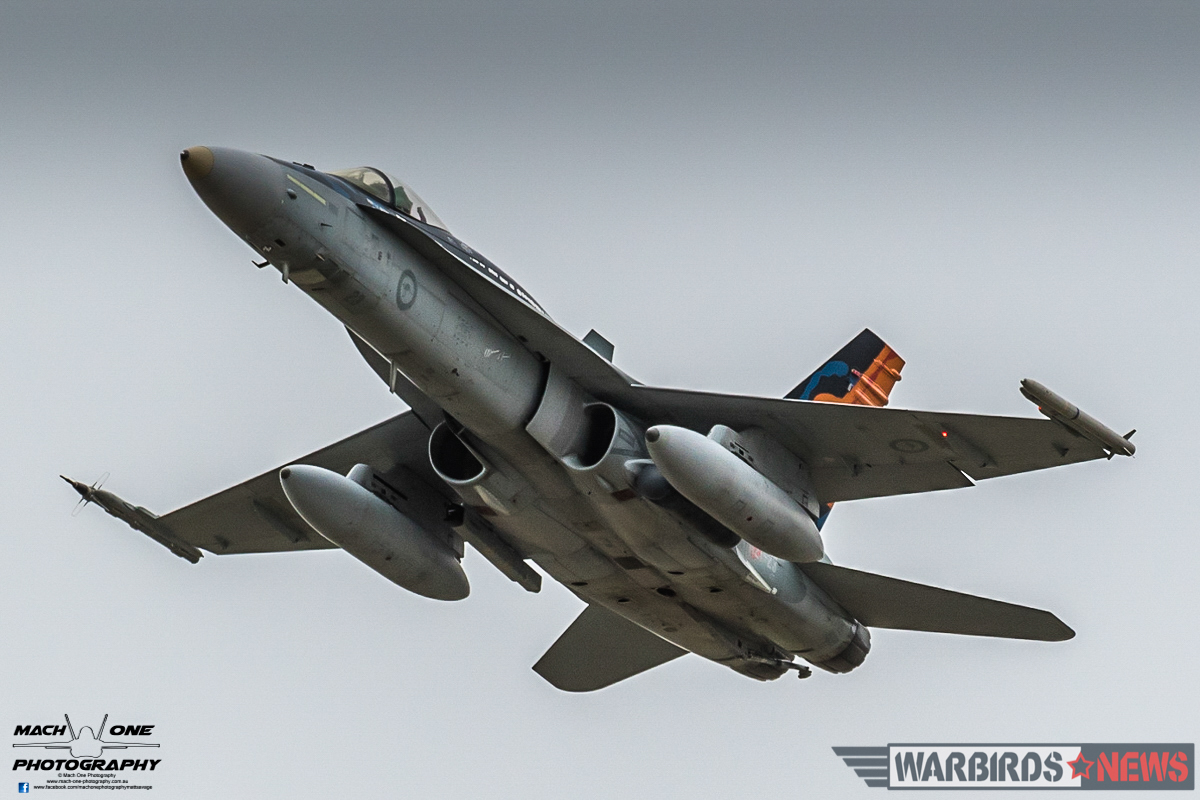 Australia’s Centenary Squadrons – A Celebration of 100 Years Defending The Country 21 F/A-18A Hornet A21-23 of No.3 Squadron RAAF giving a flight demonstration during the centennial celebrations. This particular aircraft wears special markings celebrating the Worimi people, and all those men and women of aboriginal ancestry who have served in the Australian Defense Force. (Photo by Matt Savage/Mach One Photography)