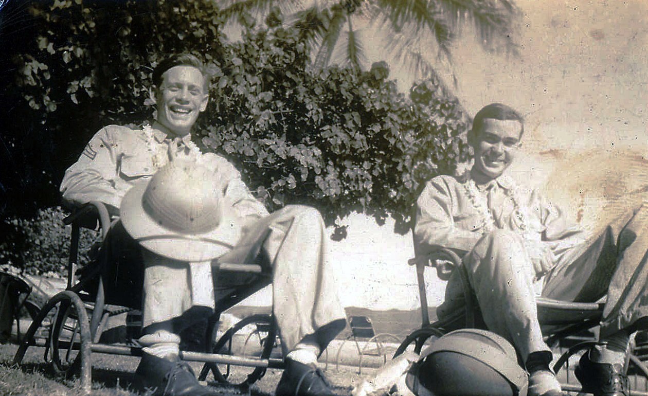 No Ordinary Soldier: My Father's Two Wars 12 The author's dad, Herb Gilmore, with his buddy, Bill Hoagland, with pith helmets and wearing leis in Honolulu.