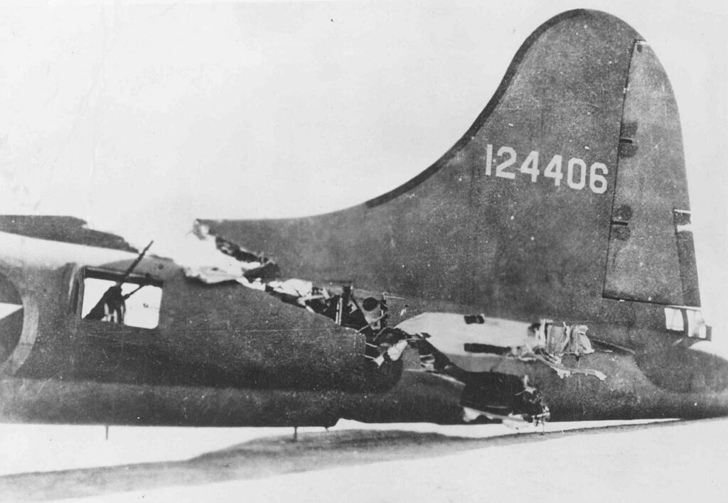 The Real Story of the B-17 “All American” 15 Damaged tail of B 17