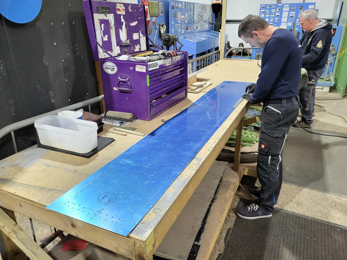 Avro Lancaster B.VII NX611 ‘Just Jane’ – Restoration Update 251 13 Dave M working on a new skin for the rear mid fuselage of NX664