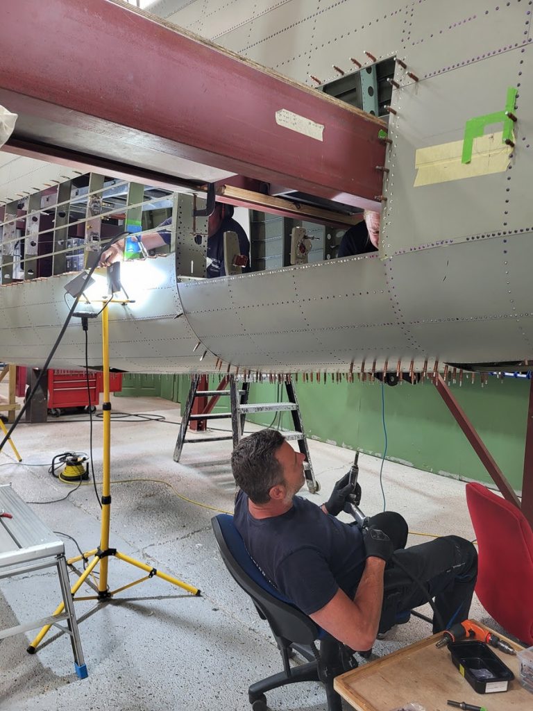 Avro Lancaster B.VII NX611 ‘Just Jane’ – Restoration Update 246 12 Dave and Jodie riveting the tail oleo box skin into position