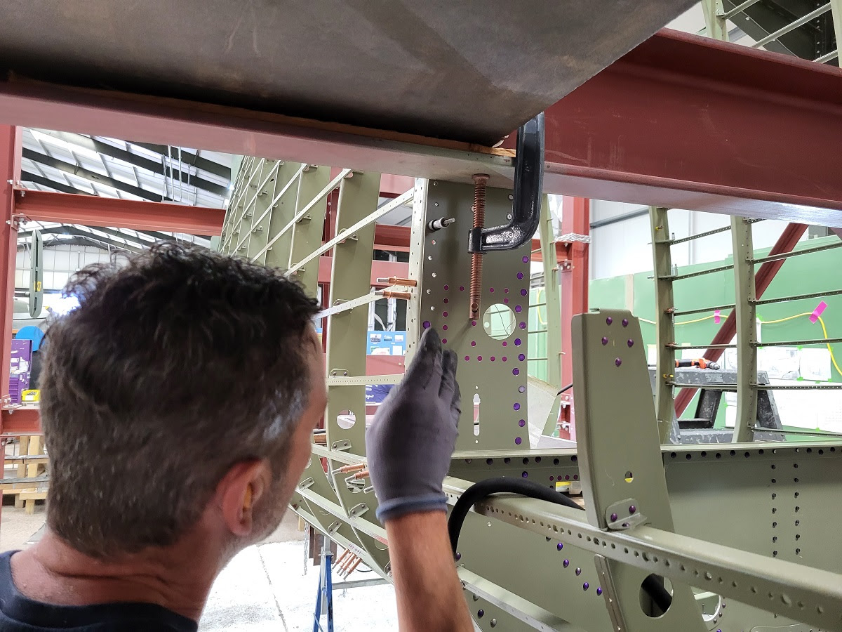 Lancaster NX611 ‘Just Jane’ – Restoration Update 226 17 Dave fitting the countersunk rivets to the tail plane former area on the rear fuselage of NX611