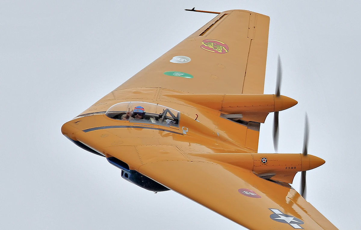 The 60th Anniversary Planes of Fame Airshow Recap 12 David Vopat Giving The Peace Sign as He Flies The N9M Flying Wing. (photo by Scott Plummer)