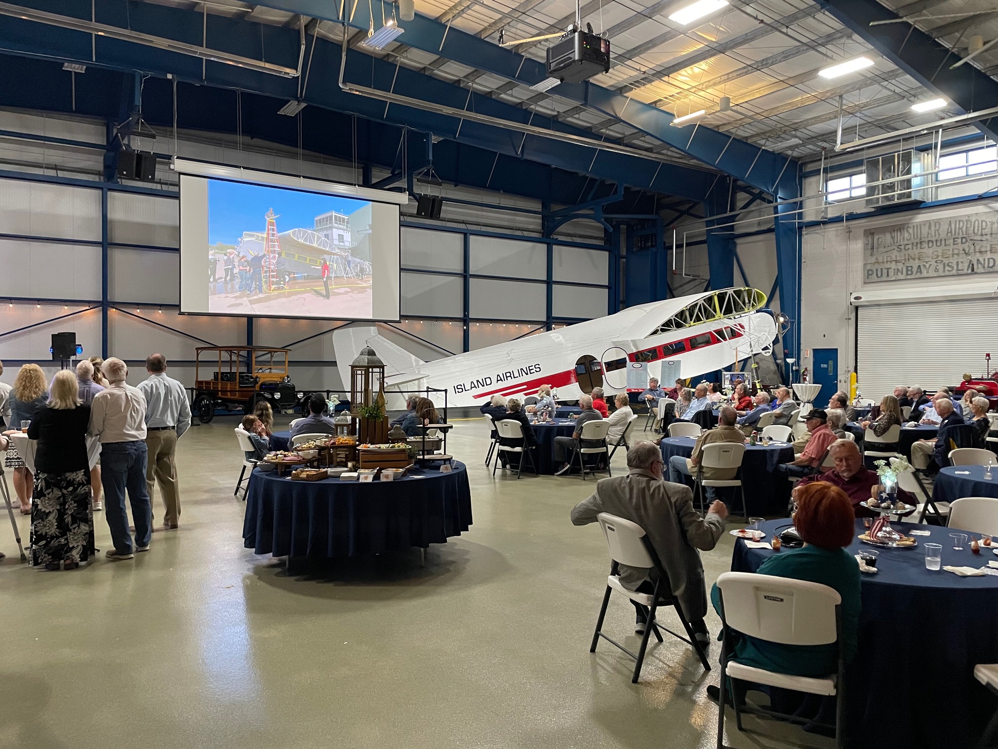 Ford Trimotor Under Restoration at The Liberty Aviation Museum 24 Dedication ceremony for completing the Island Airliners paint scheme on the fuselage and wing center section September 23 2023 Liberty Aviation Museum
