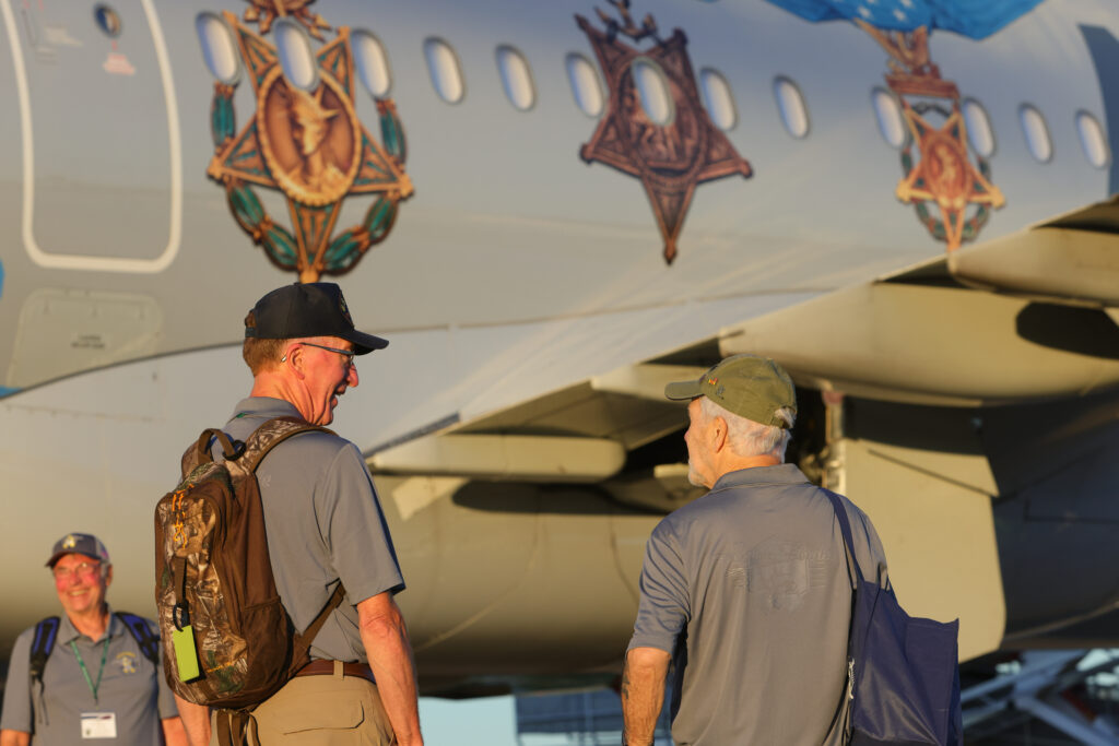 Yellow Ribbon Honor Flight Honors Veterans as Part of EAA AirVenture Oshkosh 2023 Activities 10 Departure AA Medal of Honor plane by Brett Brock