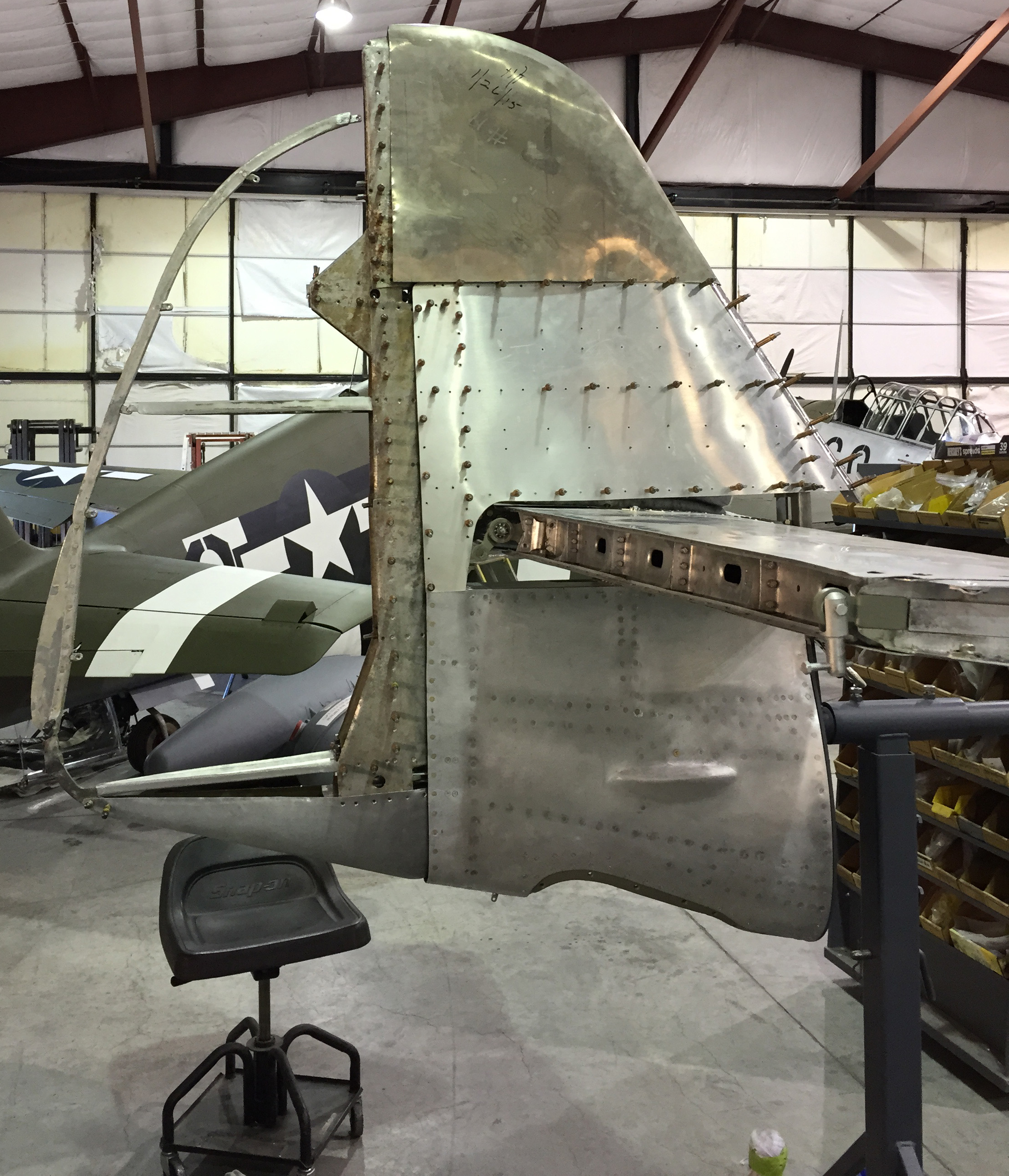 Pacific Fighters 'Messerschmitt Bf 109' - Restoration Update 13 The rudder and vertical stabilizer coming together at Pacific Fighters. The rudder leading edge and counterweights shown here are from a French crash site and being used as patterns, alongside original German blueprints, to recreate the proper G-10 tail assemblies. (photo via Pacific Fighters)