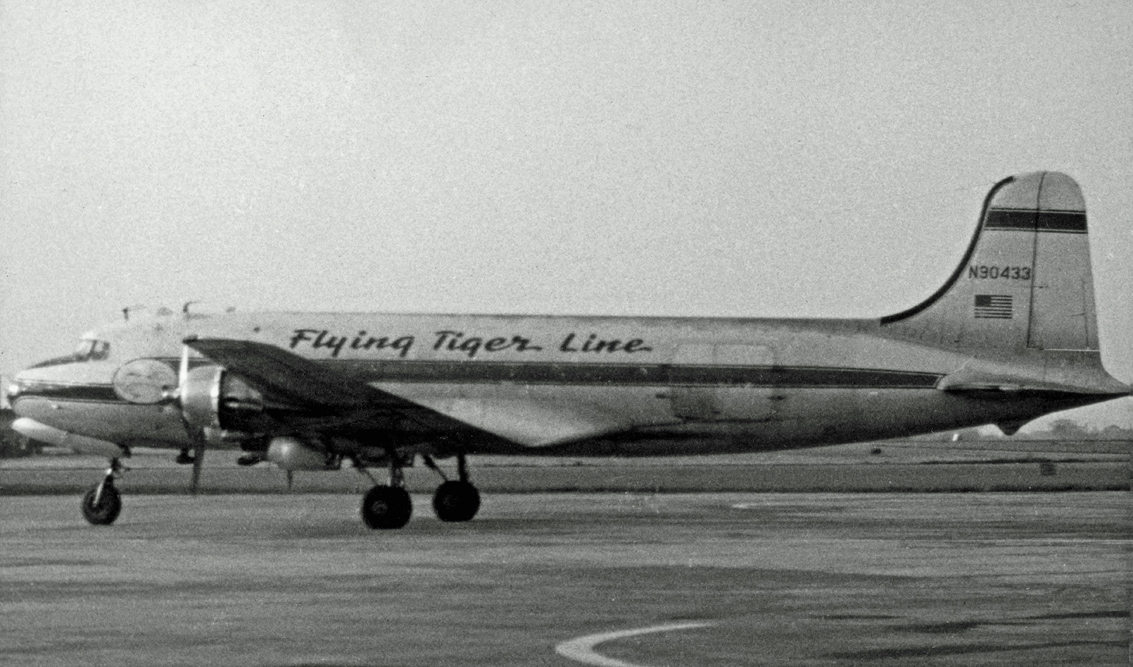 The Flying Tiger Line: How a Wartime Legacy Shaped Global Air Cargo 13 Douglas C 54A Skymaster N90433 of Flying Tiger Line at Manchester Ringway Airport