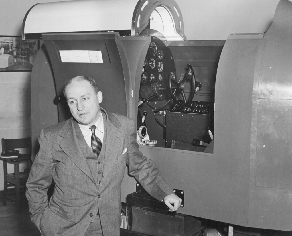 Today in Aviation History: Ed Link Introduces the Ground-Based Flight Trainer 12 Edwin Albert Link jr with a Link Flight Trainer image via Binghamton University Librarysmall 1536x1242 1