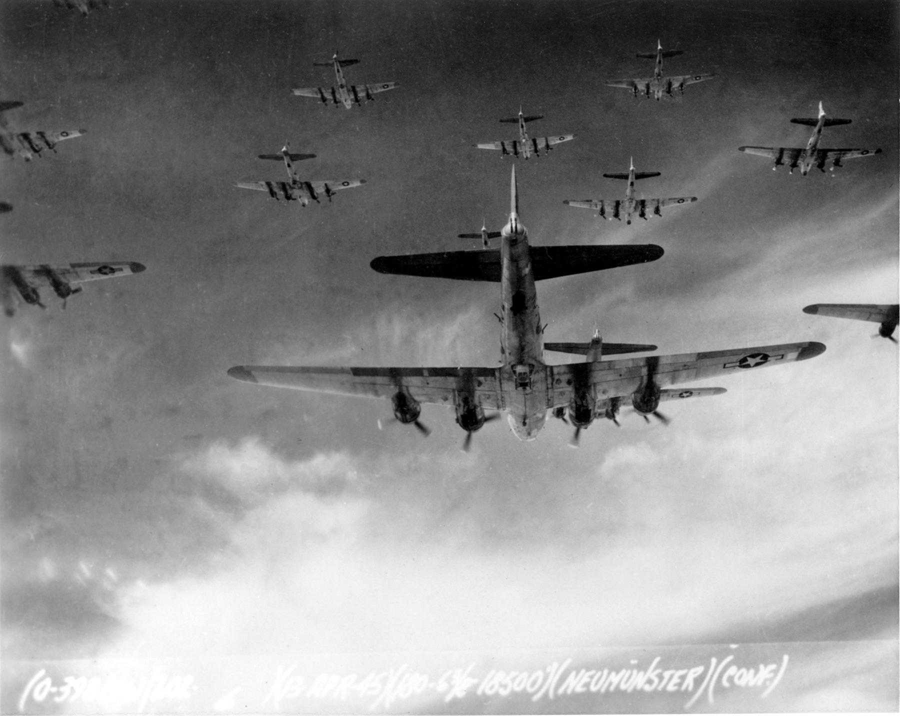 The Mustang and the Merlin 13 Eight Air Force B 17 Flying Fortresses from the 398th Bombardment Group fly a bombing run to Neumunster Germany on April 13 1945