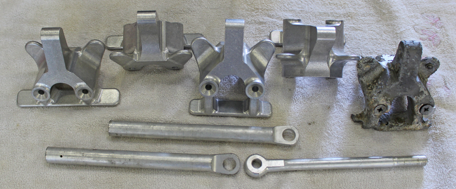 XP-82 Twin Mustang - May, 2015 - Restoration Update 22 The newly manufactured up-lock forgings and rods. The original, corroded example can be seen on the extreme right. (photo via Tom Reilly)