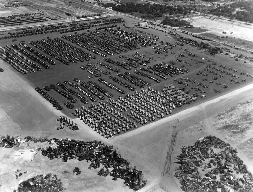 Ghosts of Pearl Harbor: Saving the Crossroads to Marine Aviation in the Pacific Theater 23 Oct. 1945: A month after Japan's unconditional surrender, the ramps at Ewa being used to inventory and deactivate hundreds of USN and USMC aircraft. Awaiting their fate are Corsairs, Wildcats, Hellcats, Avengers, Helldivers, and various other combat aircraft. The cluster of aircraft in the foreground are Avenger torpedo-bombers, already beginning the scrapping process.