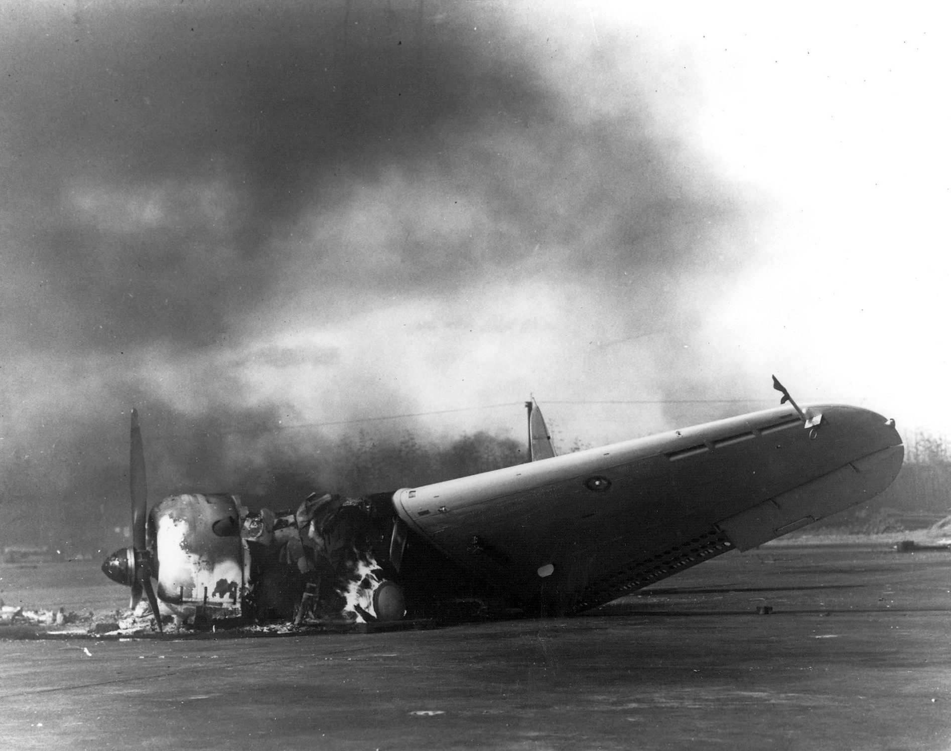 Ghosts of Pearl Harbor: Saving the Crossroads to Marine Aviation in the Pacific Theater 11 The remains of a Douglas SBD Dauntless dive-bomber burns on Ewa's ramp on Dec. 7, 1941.