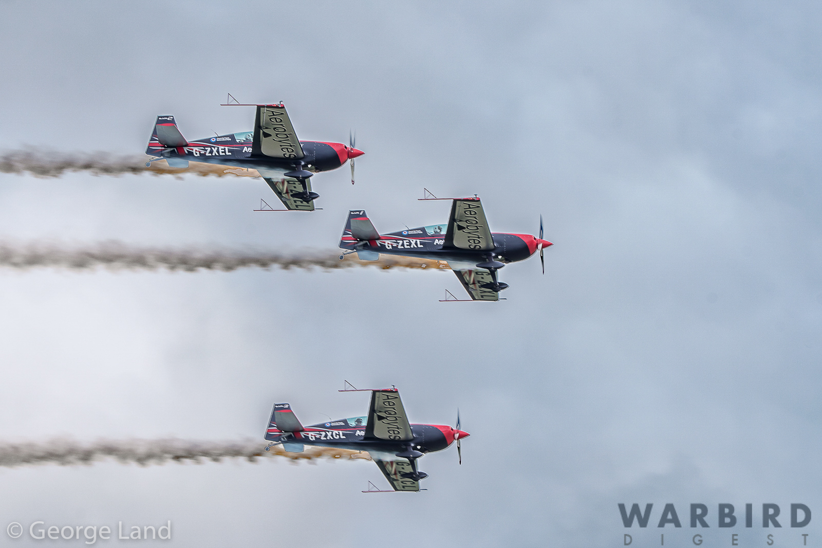 Duxford Air Festival - Air Show Report 49 Extra EA300L Aerobytes Blades aerobatic team Blades 1 2 3 D75 5111