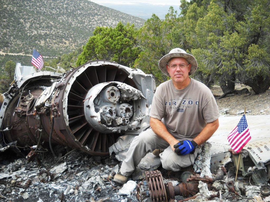 Aviation Archaeology and Wreckchasing Symposium Returns to Las Vegas for 12th Annual Gathering 12 F 100C Dave Trojan with Memorial flags photo by Dave McCurry