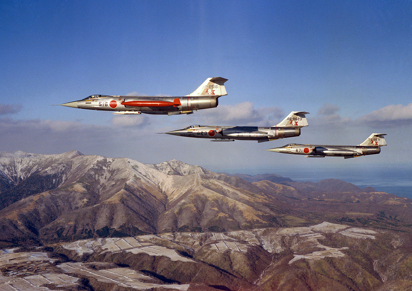 Former JASDF F-104J Starfighter Restored in Japan 13 F-104Js flying over Japan. (photo via JASDF Chitose Air Base)