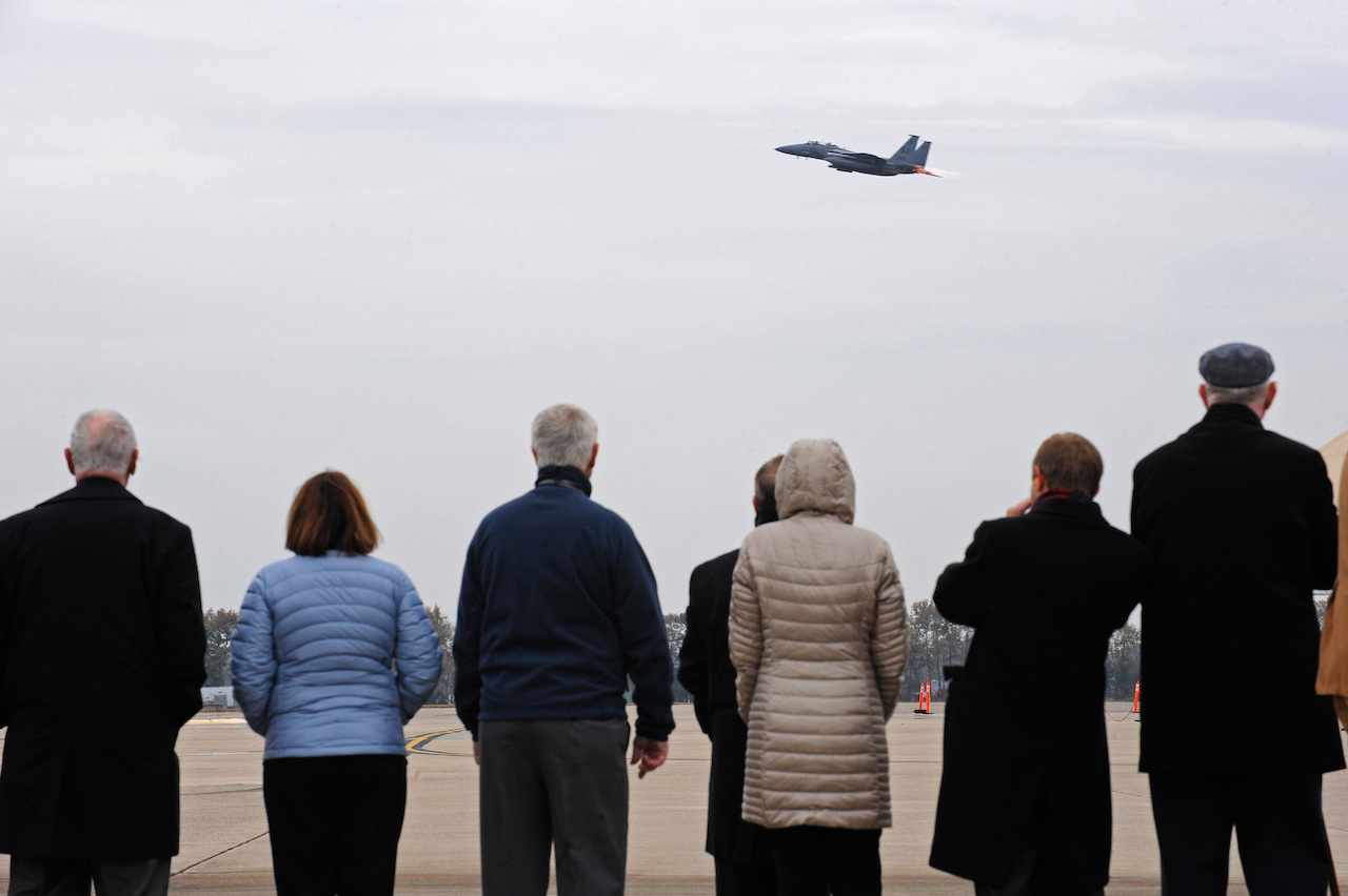 Keeping a Memory Alive: Family Honors Lost Loved One, 4th FW Hero. 12 Family and friends of Capt. William Jarman Jr., an F-4 Phantom pilot with the 335th Tactical Fighter Squadron during the 1960s, who died in 1969 during an aircraft collision over Fort Bragg, N.C., watch as an F-15E Strike Eagle takes off from Seymour Johnson Air Force Base, N.C., Nov. 14, 2014. Jarman's family and friends visited the base to connect with the Airmen of the 335th Fighter Squadron, a squadron Jarman dedicated his life to. (U.S. Air Force photo/Airman 1st Class Aaron Jenne)