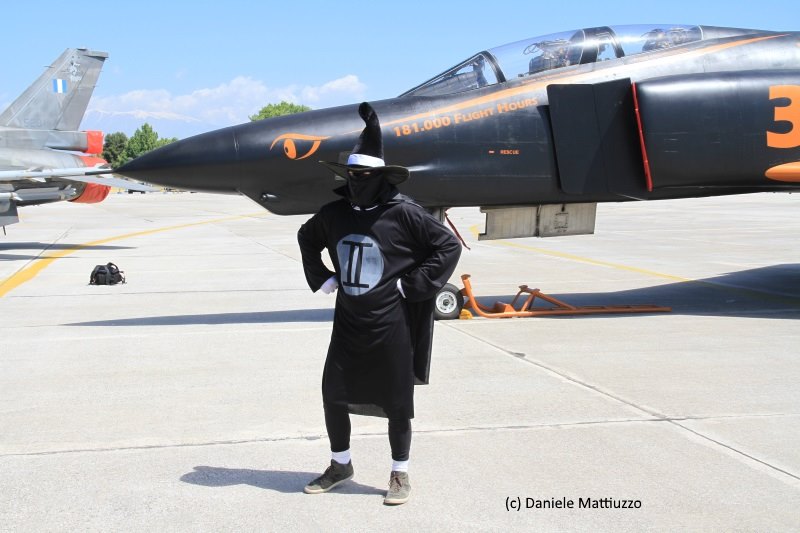 "The End of the Film" - Hellenic Air Force RF-4E Phantom II Retirement 16 A man poses beside the 348TRS RF-4E display ship dressed in a real-life representation of the famous Phantom II cartoon character 'Spooky'. Note the title on the aircraft's nose 181,000 Flight Hours... This is the total number of flying hours that the unit flew in 64 years, of wich 98,000 were on RF-4E Phantoms. (photo by Daniele Mattiuzzo)