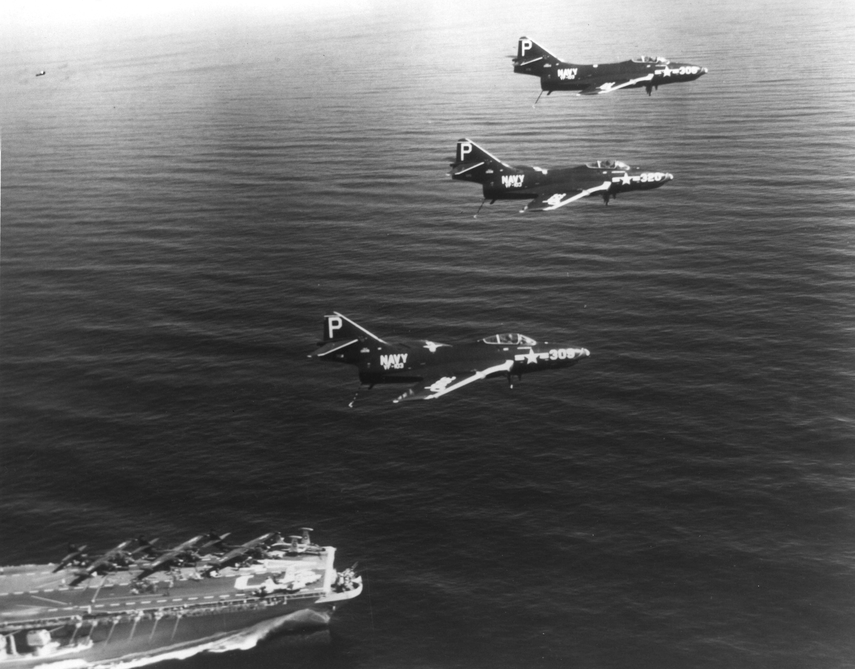 John Young - The Passing of a Legend 11 F9F 6 Cougars of VF 103 over USS Coral Sea CVA 43 1954