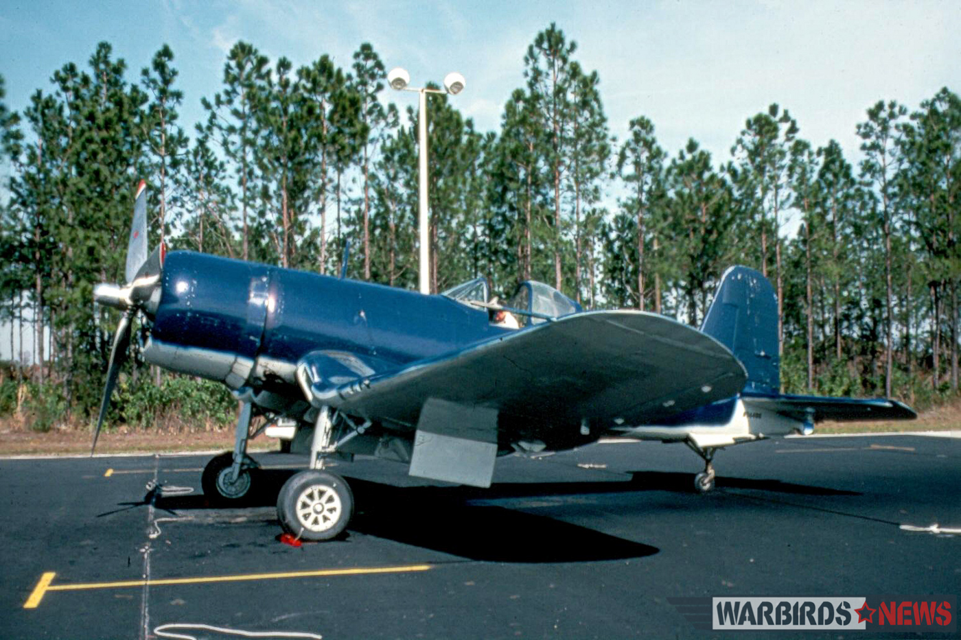 POOR LITTLE LAMBS - The Corsairs of Baa Baa Blacksheep 16 FG-1D Bu.92433 at Kissimmee in 1979, not too long before her demise in a hangar fire. (photo by Bill Thomas)