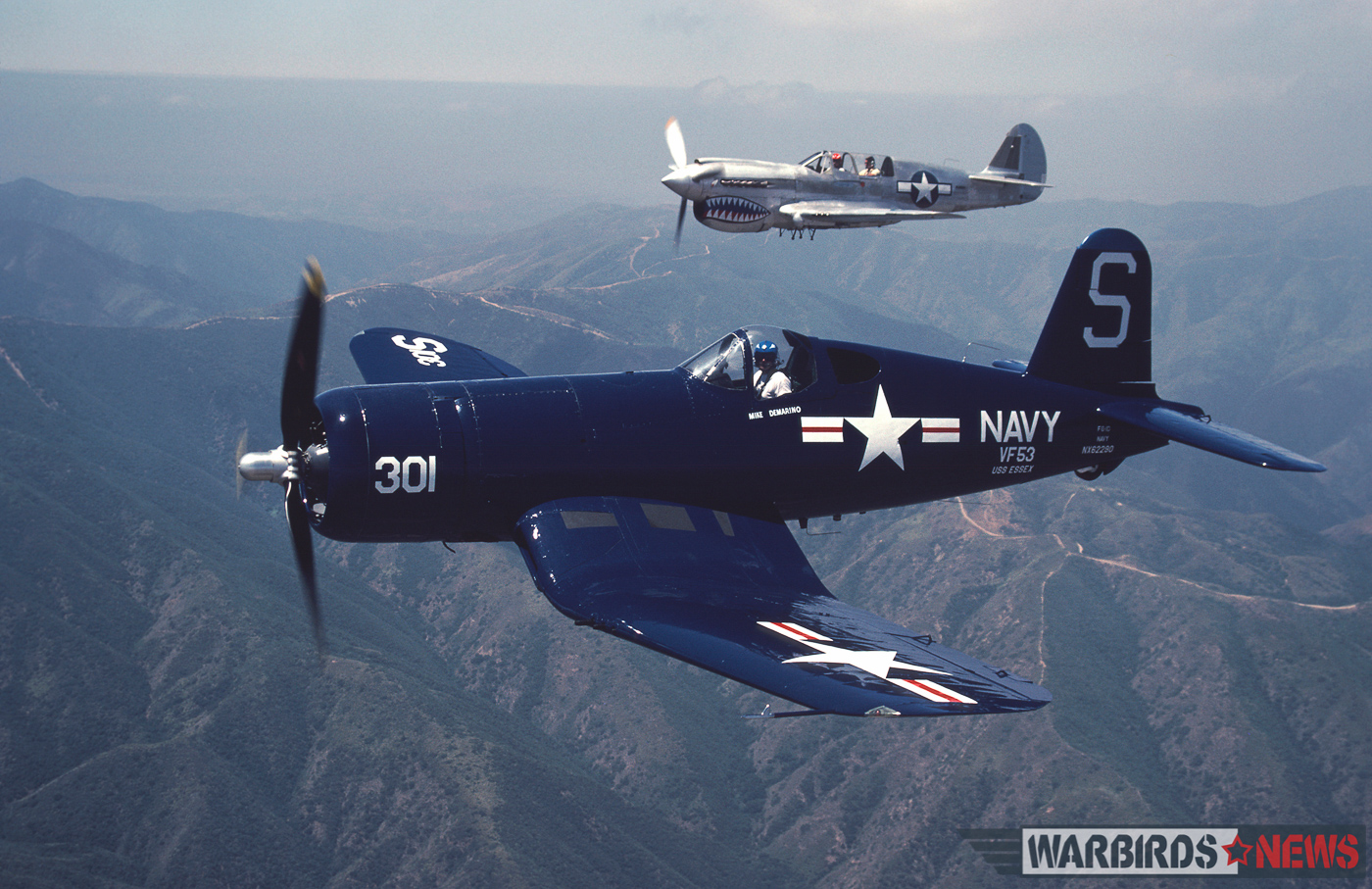 POOR LITTLE LAMBS - The Corsairs of Baa Baa Blacksheep 30 FG-1D Bu.92629 in formation with the Planes of Fame P-40N. (photo by Frank Morello)